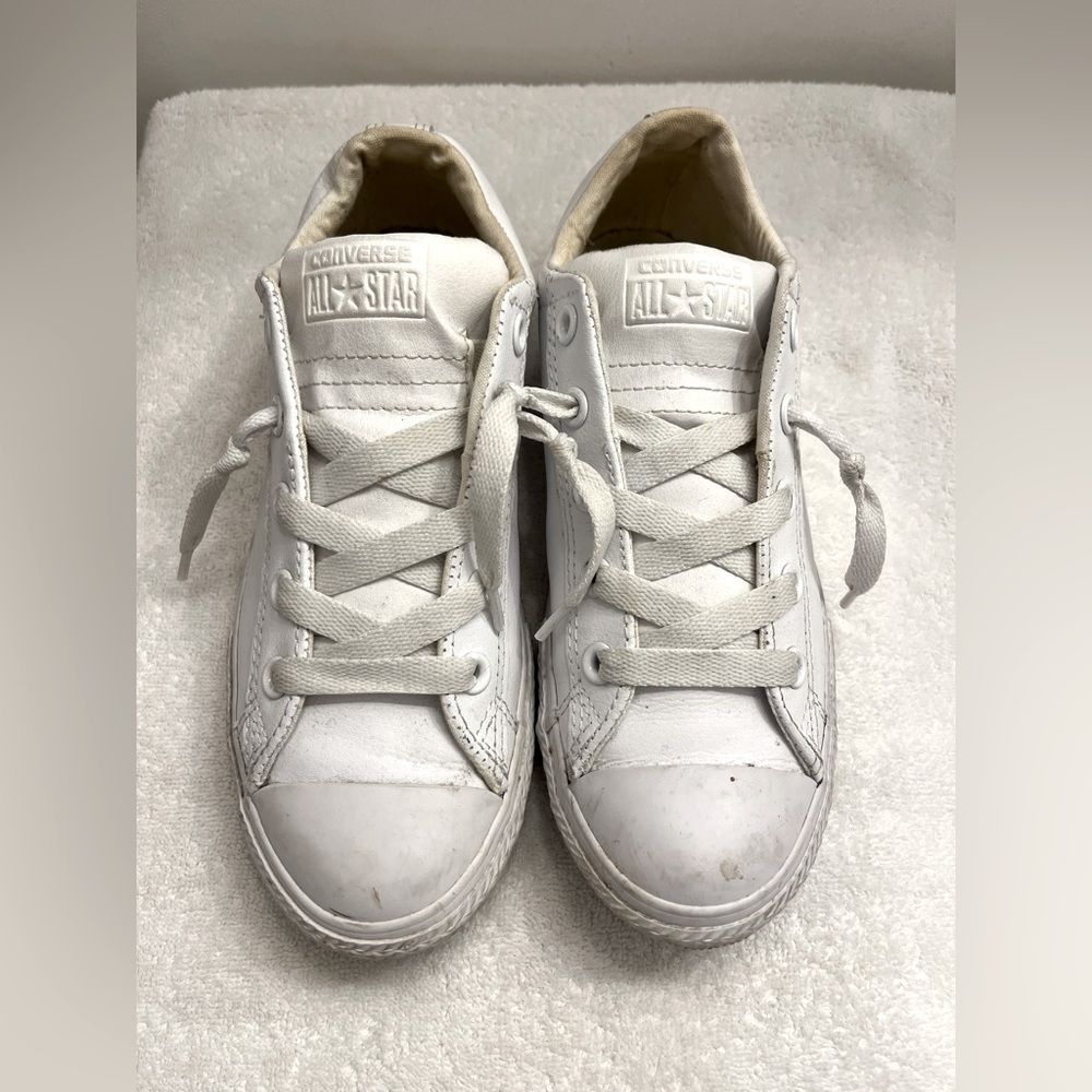 White leather low top converse
